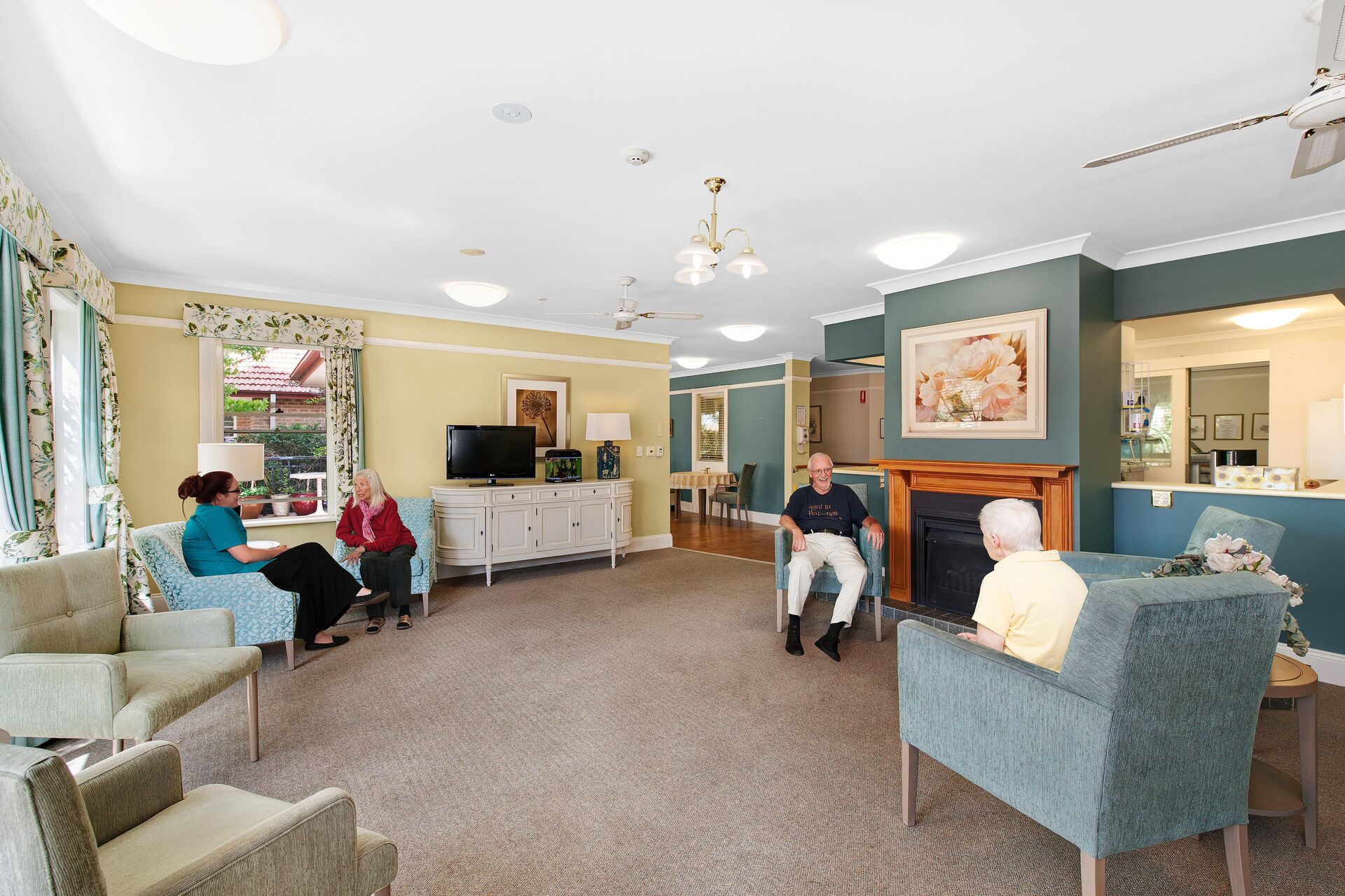 spacious sitting area with lounges for aged care residents at baptistcare morven gardens aged care home in leura nsw blue mountains
