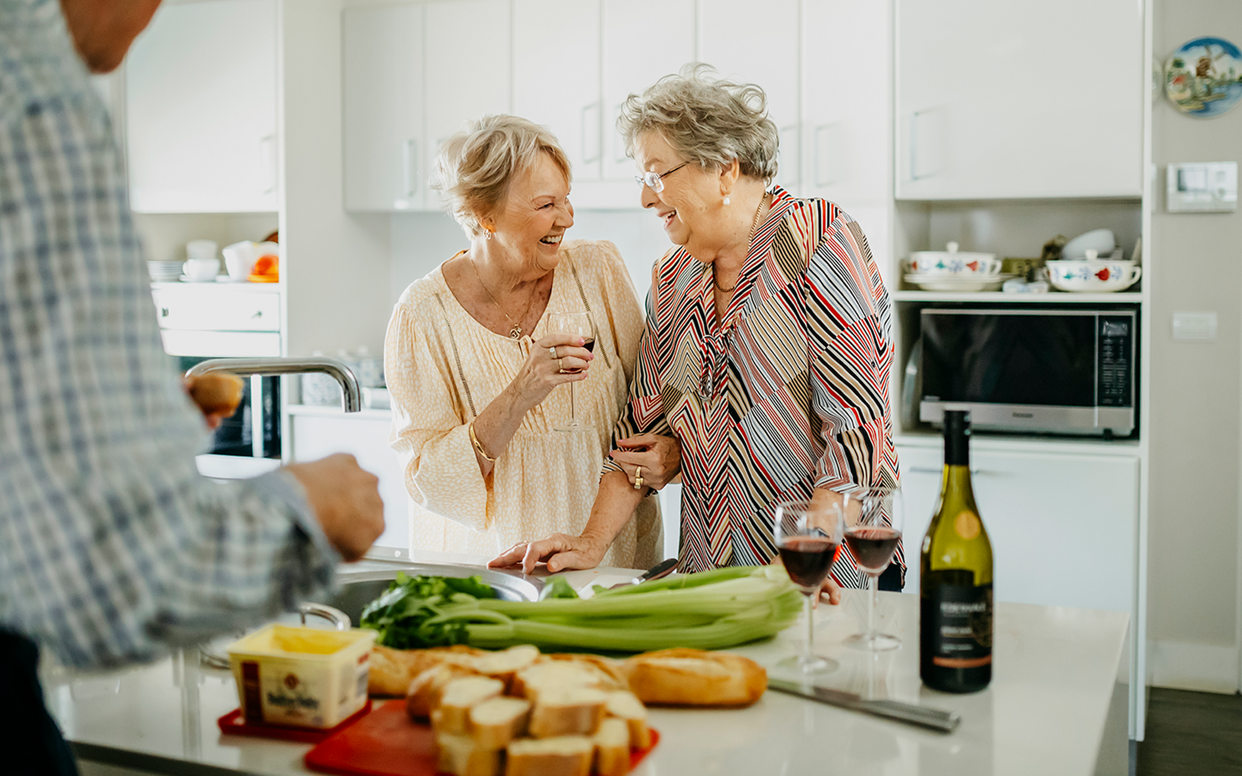 Group of over 55s sharing a meal at retirement villages in Sydney