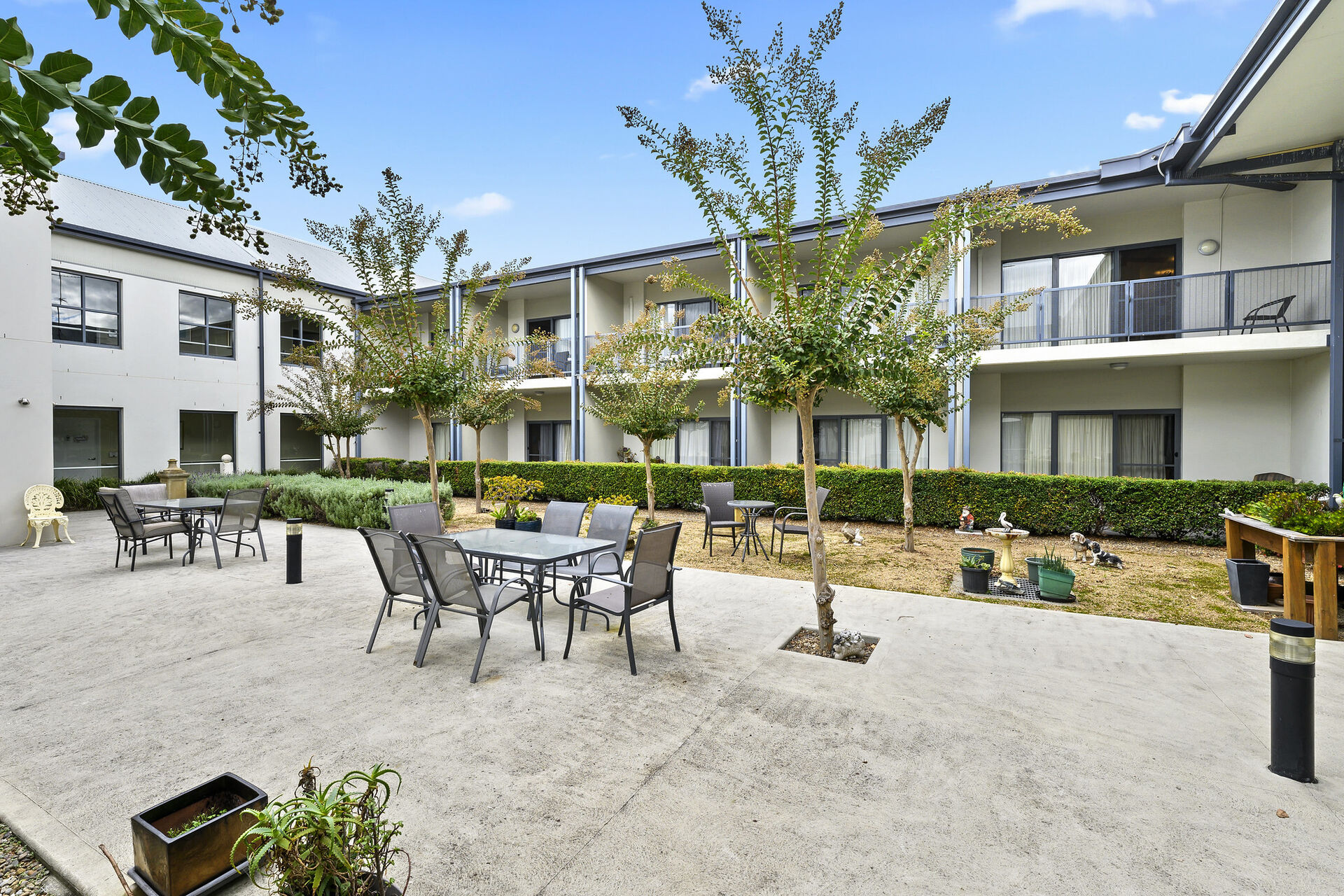 outdoor sitting area for nursing home residents at baptistcare durham green centre aged care home in menangle nsw