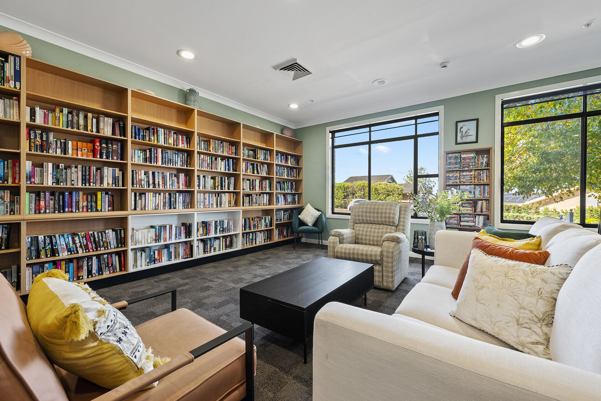 communal library at baptistcare blue hills retirement village in prestons nsw