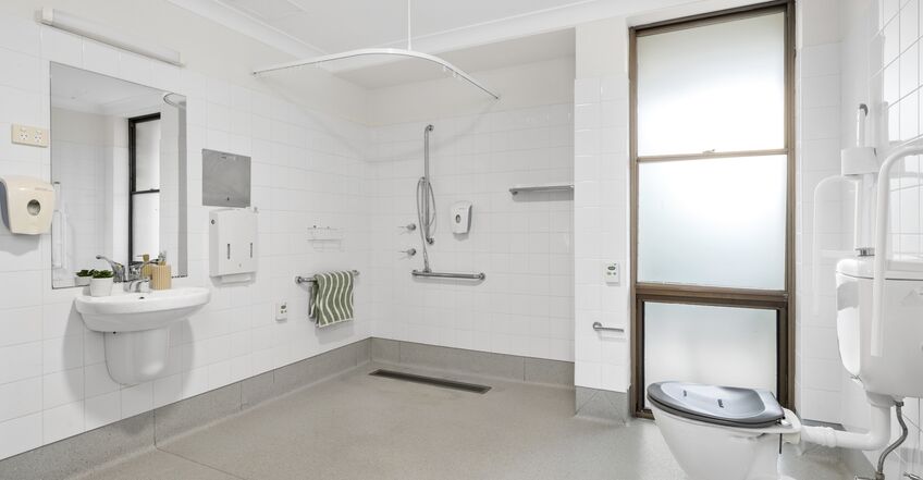 large ensuite bathroomm for four elderly aged care residents including dementia care in baptistcare aminya centre residential aged care home