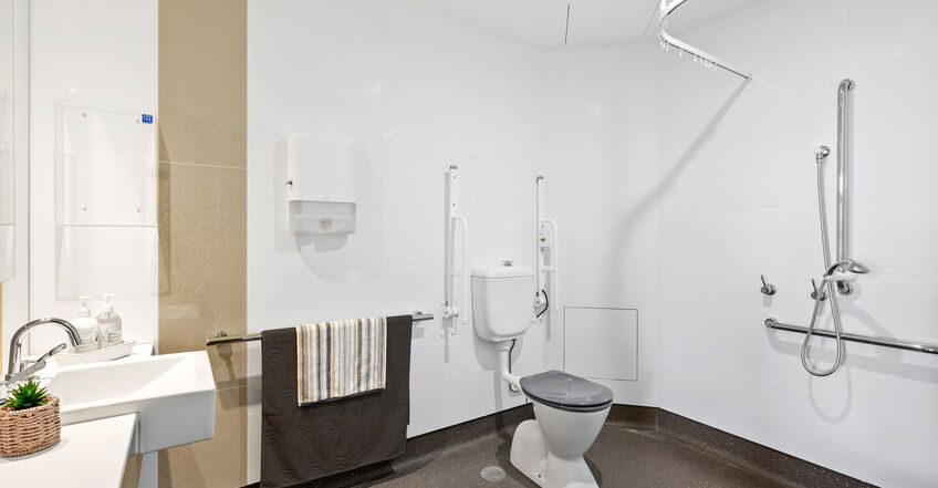 ensuite for spacious single room for elderly aged care resident including dementia care in baptistcare griffith centre residential aged care home griffith act