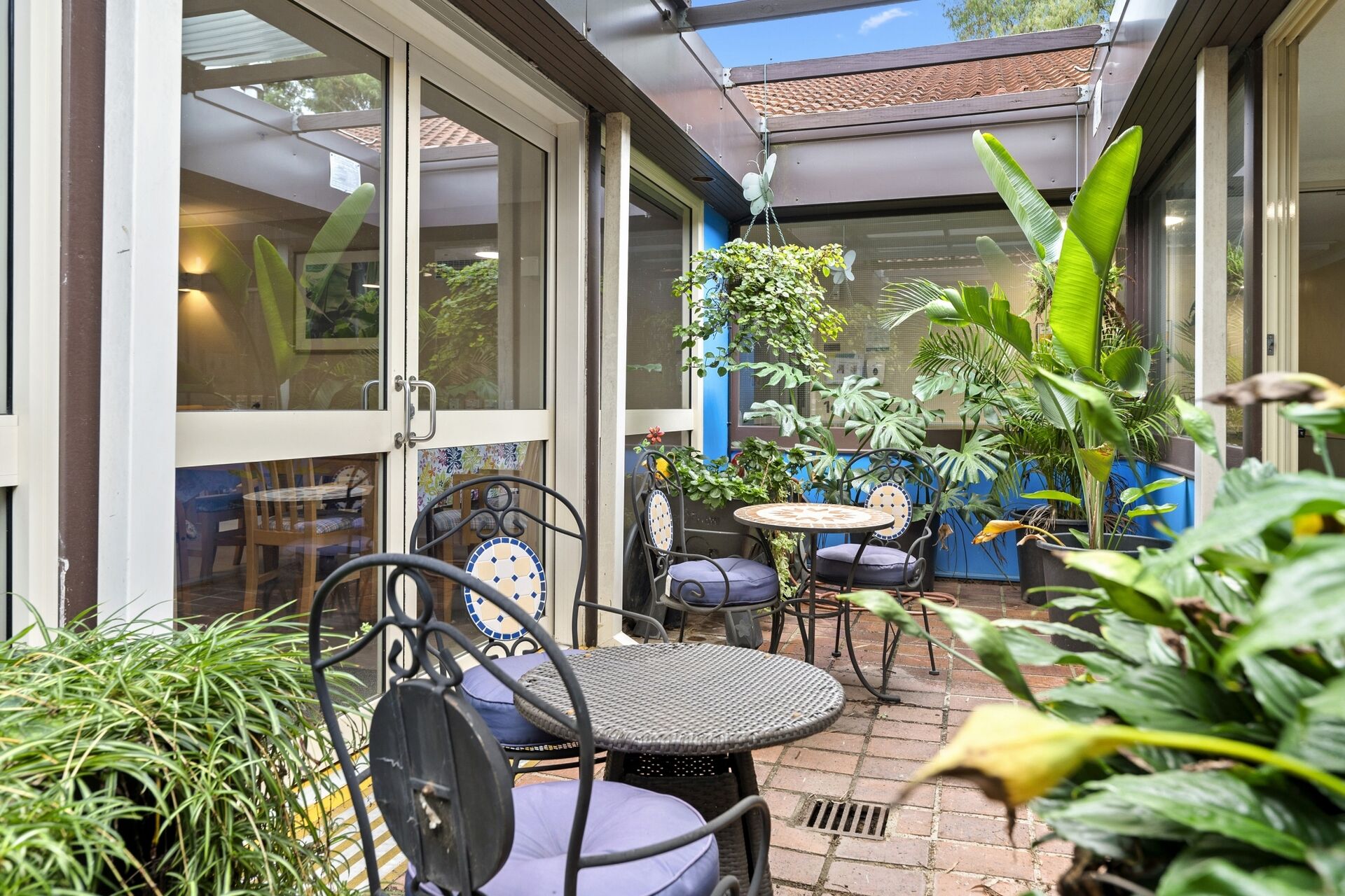 Social outdoor garden area at aminya centre aged care home in baulkham hills for low care and dementia