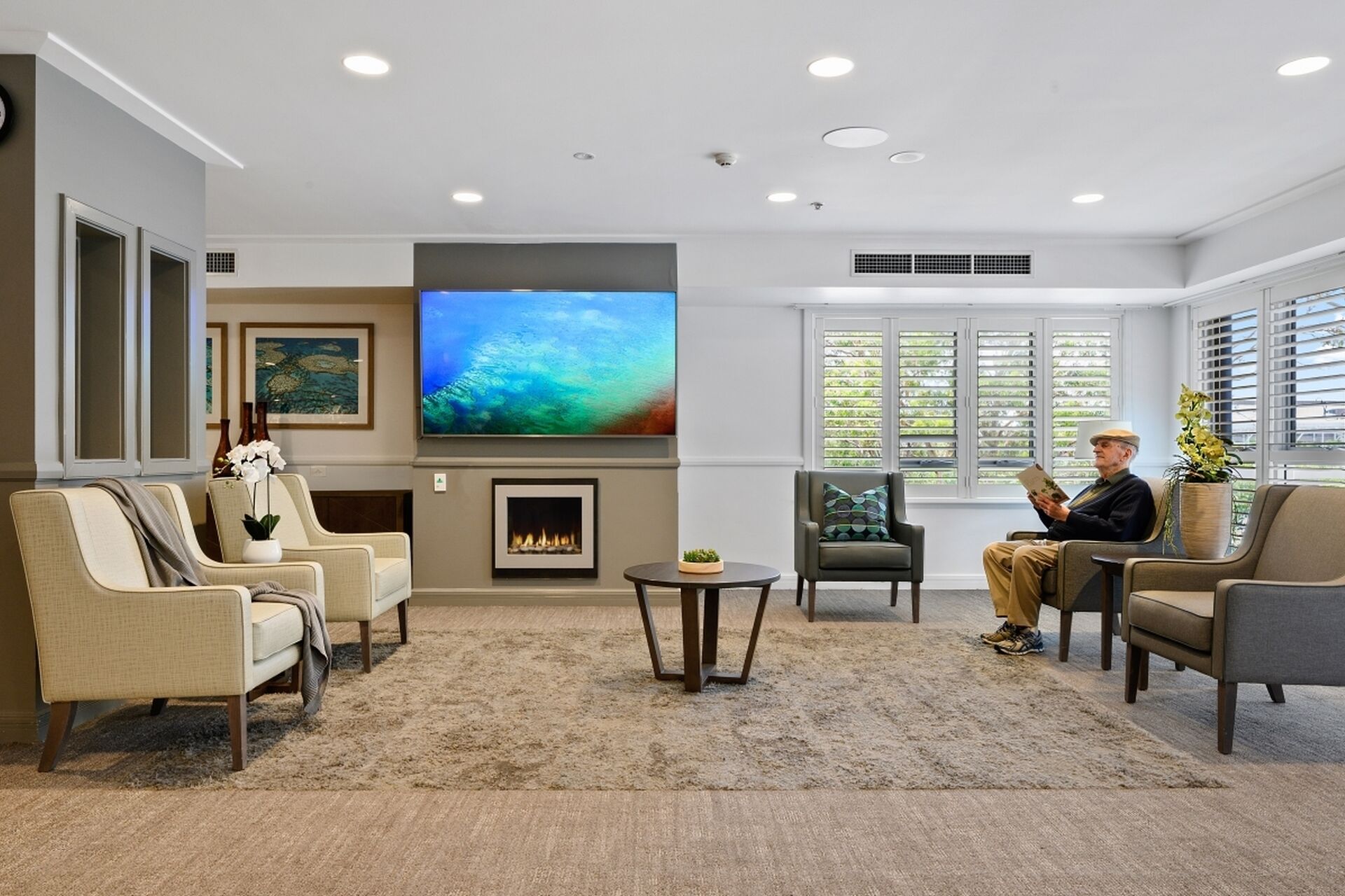 modern lounge room for aged care residents to socialise and watch television at baptistcare shalom centre aged care home in macquarie park nsw