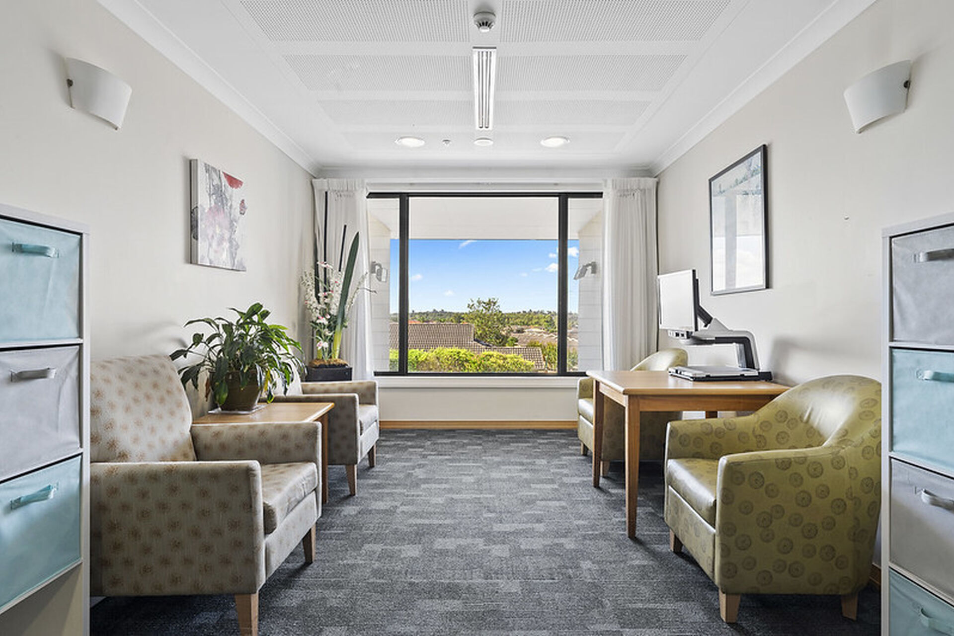 communal reading sitting space for aged care residents to enjoy quiet time at baptistcare blue hills manor residential aged care home in prestons nsw