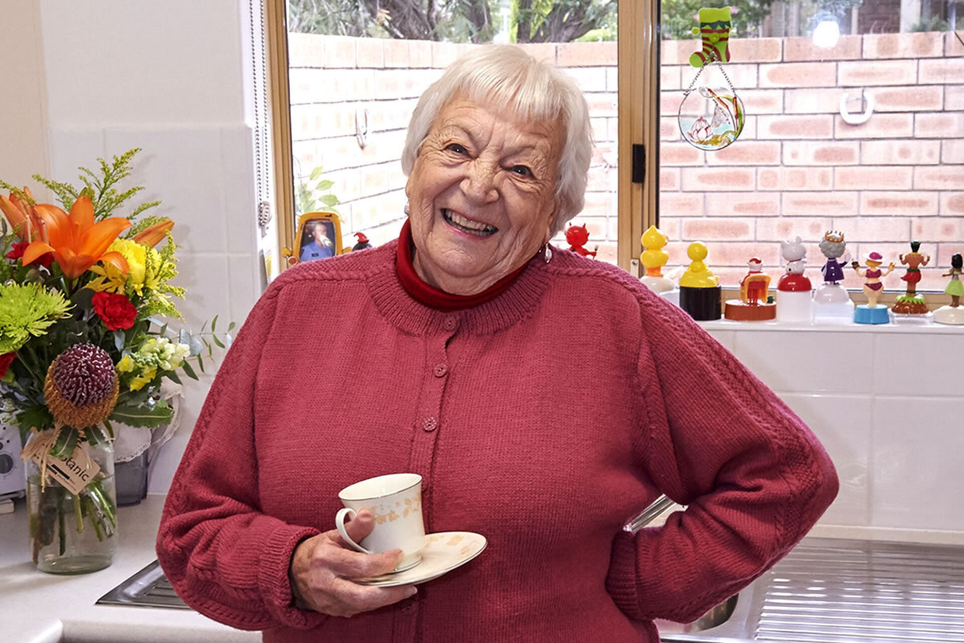 a smiling resident of one of the retirement villas at the over 55s baptistcare bethel retirement village in albany wa