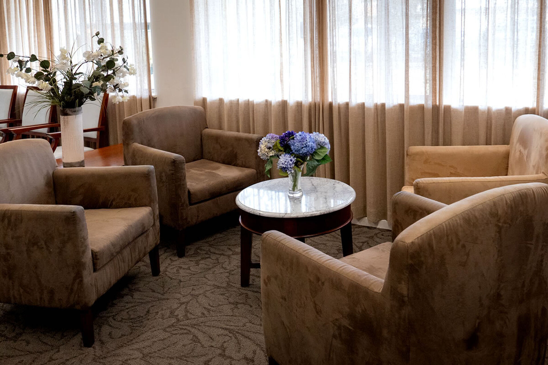 spacious sitting area for nursing home residents at baptistcare balladong gardens aged care home in york wa