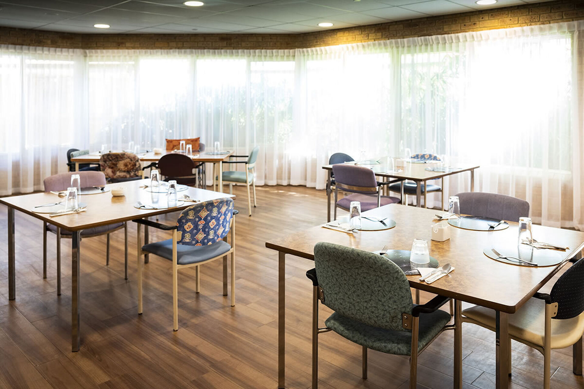 modern communal dining room for nursing home residents to be served fresh meals at baptistcare gracehaven aged care home in rockingham wa