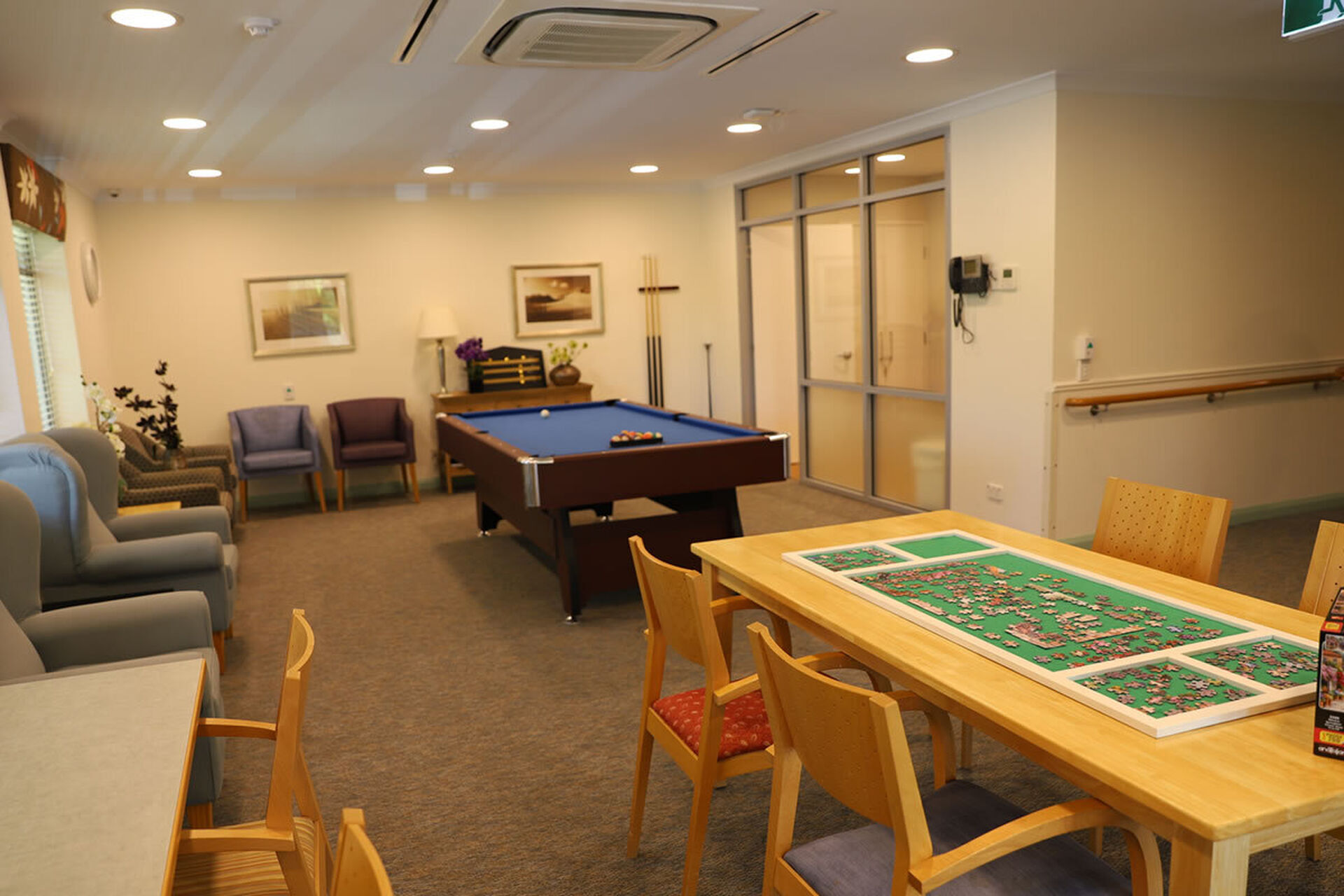 modern activities and games room at baptistcare gracewood aged care home in salter point wa