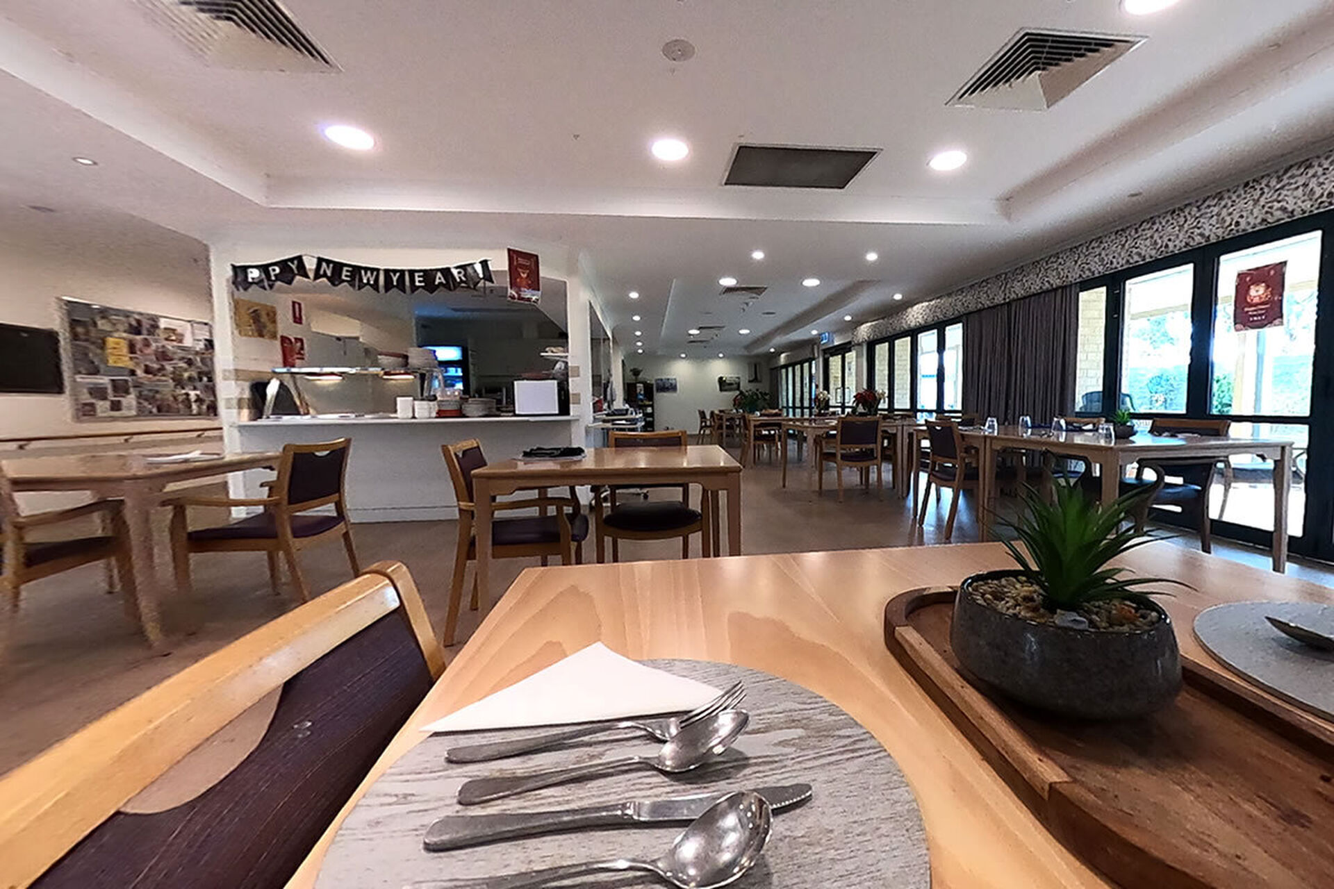 modern communal dining room for nursing home residents to be served fresh meals at baptistcare mirrambeena aged care home in margaret river wa