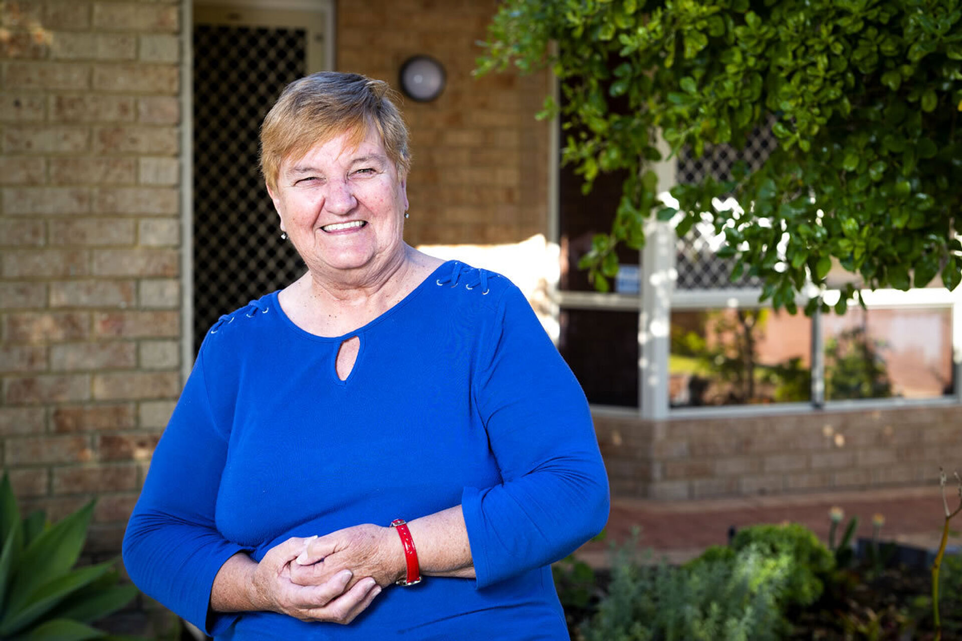 a smiley resident of one of the retirement villas at the over 55s baptistcare gracehaven retirement village in rockingham wa