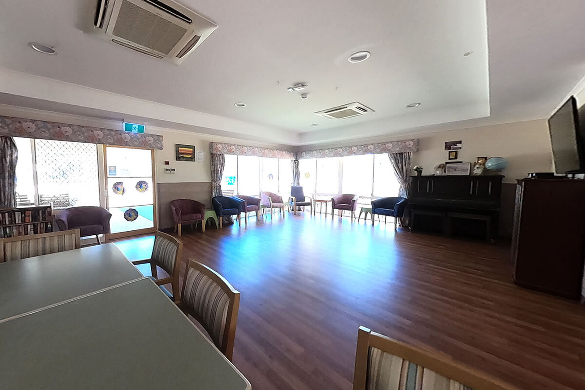 spacious sitting area and activities room for nursing home residents at baptistcare kalkarni nursing home brookton wa