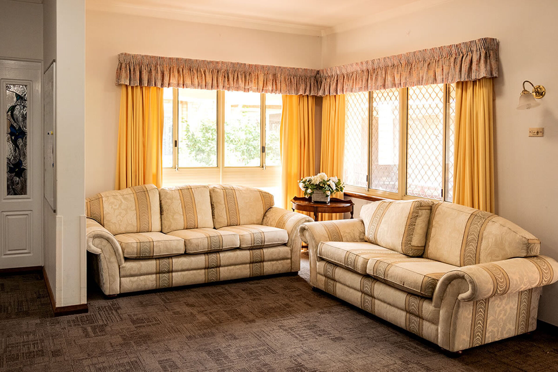 spacious sitting area for nursing home residents at baptistcare morrison gardens aged care home in midland wa