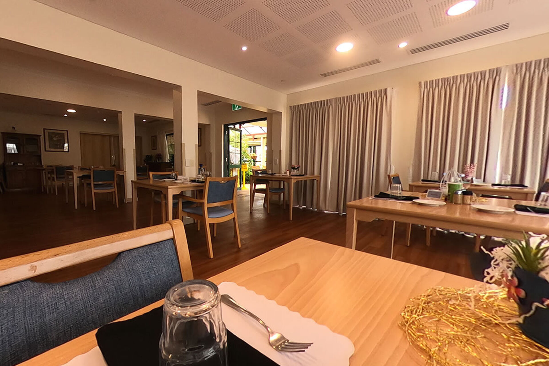 modern communal dining room for nursing home residents to be served fresh meals at baptistcare william carey court aged care home in busselton wa