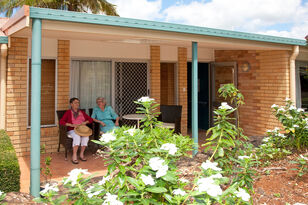 two aged care residents socialising on the balcony of baptistcare maranoa centre aged care home in alstonville far north coast nsw near ballina and lismore