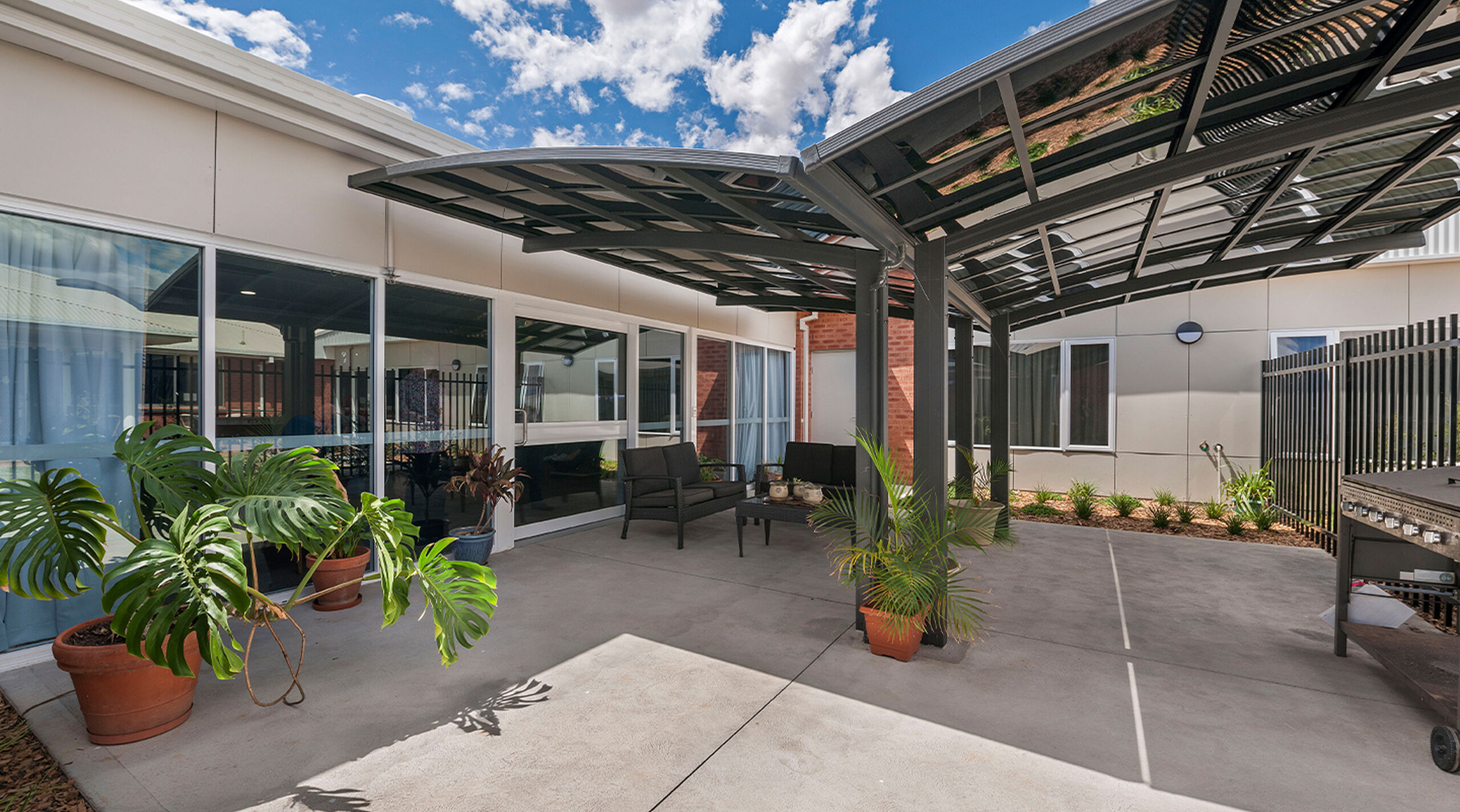 modern outdoor sitting area for nursing home residents at baptistcare niola centre aged care home in parkes nsw