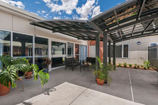 modern outdoor sitting area for nursing home residents at baptistcare niola centre aged care home in parkes nsw