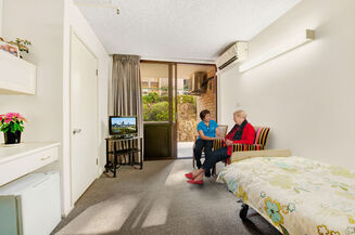 spacious single room for elderly aged care resident including dementia care in baptistcare cooinda court macquarie park nsw northern sydney residential aged care home
