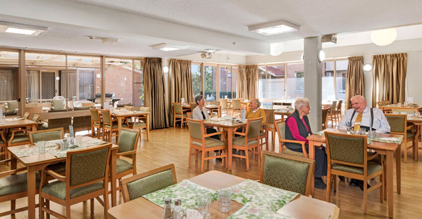 communal sitting area for games and socialising for elderly aged care residents in baptistcare dorothy henderson lodge macquarie park nsw northern sydney residential aged care home