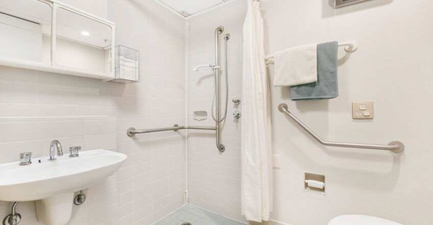 ensuite for spacious single room for elderly aged care resident including dementia care in baptistcare dorothy henderson lodge macquarie park nsw northern sydney residential aged care home