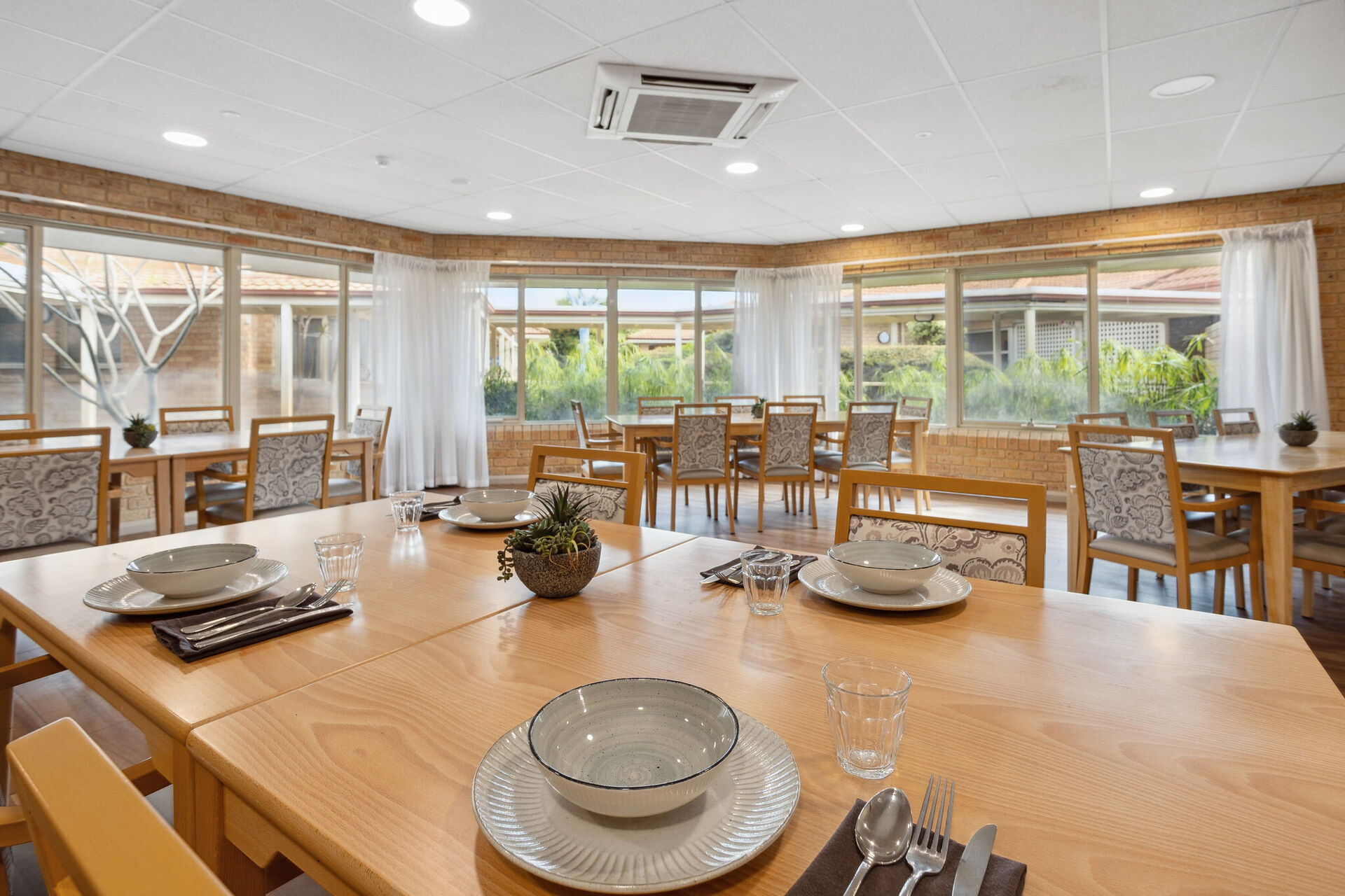 large communal dining room at baptistcare gracehaven aged care home in rockingham wa for nursing home residents and dementia care