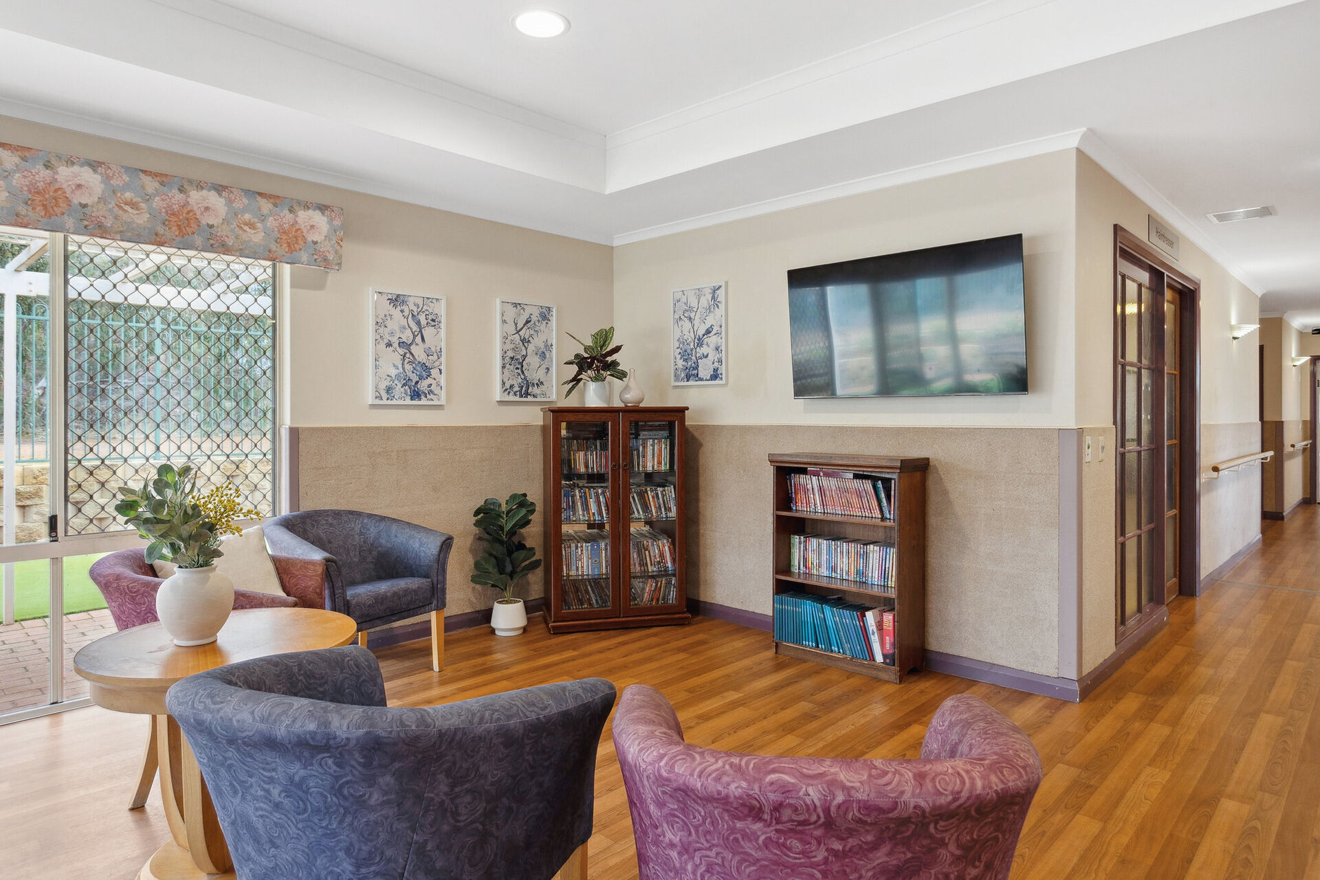 spacious sitting area and activities room at baptistcare kalkarni nursing home brookton wa for elderly aged care residents