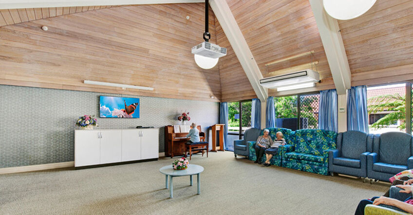 large communal space for elderly aged care residents to socialise in baptistcare aminya centre residential aged care home