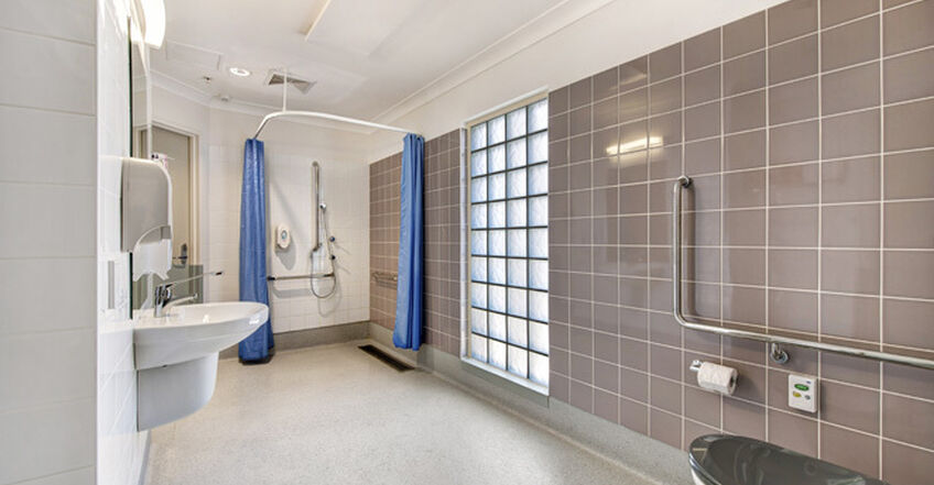 large ensuite bathroomm for four elderly aged care residents including dementia care in baptistcare aminya centre residential aged care home