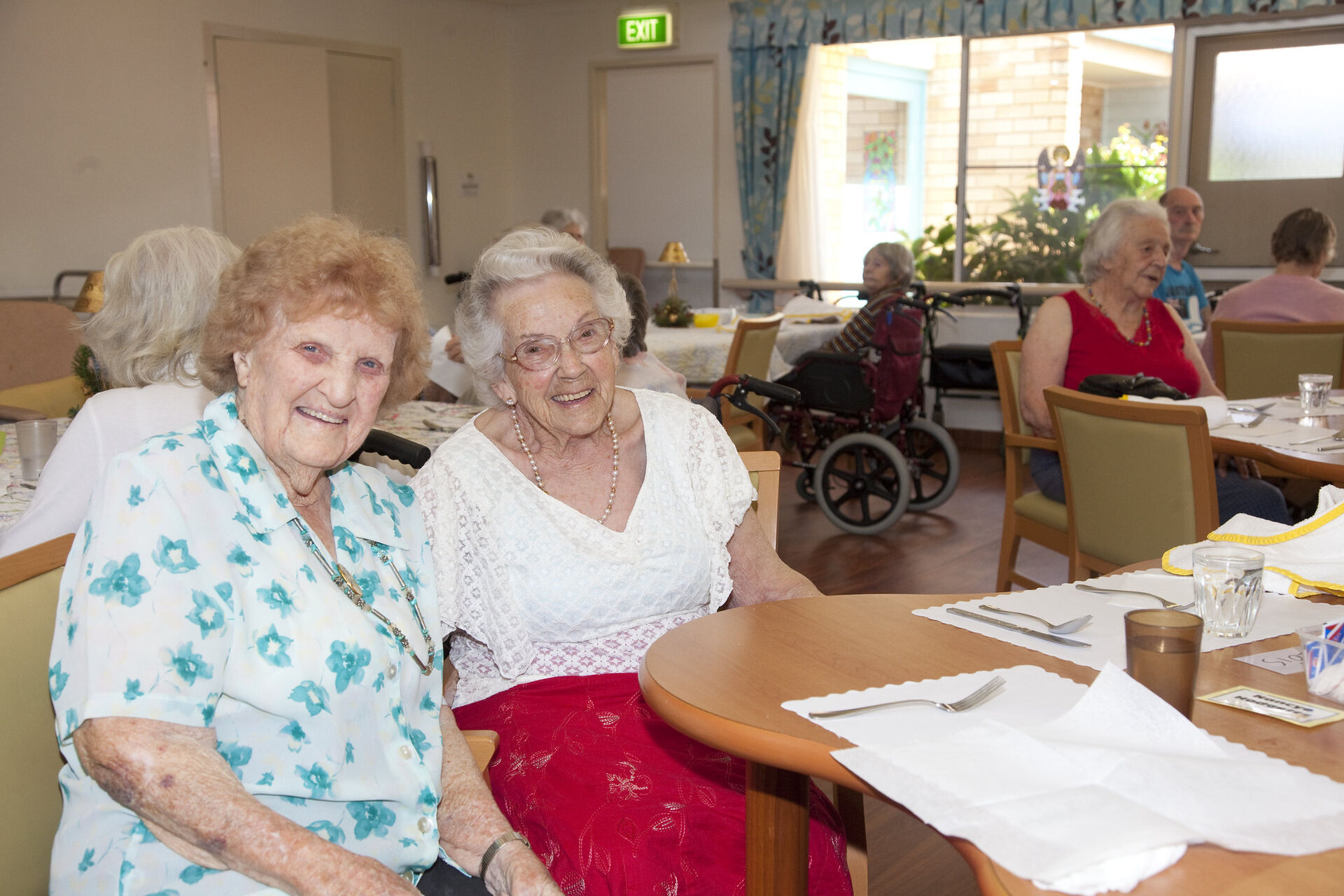 two aged care residents socialising at an organised activity at baptistcare maranoa centre aged care home in alstonville nsw far north coast