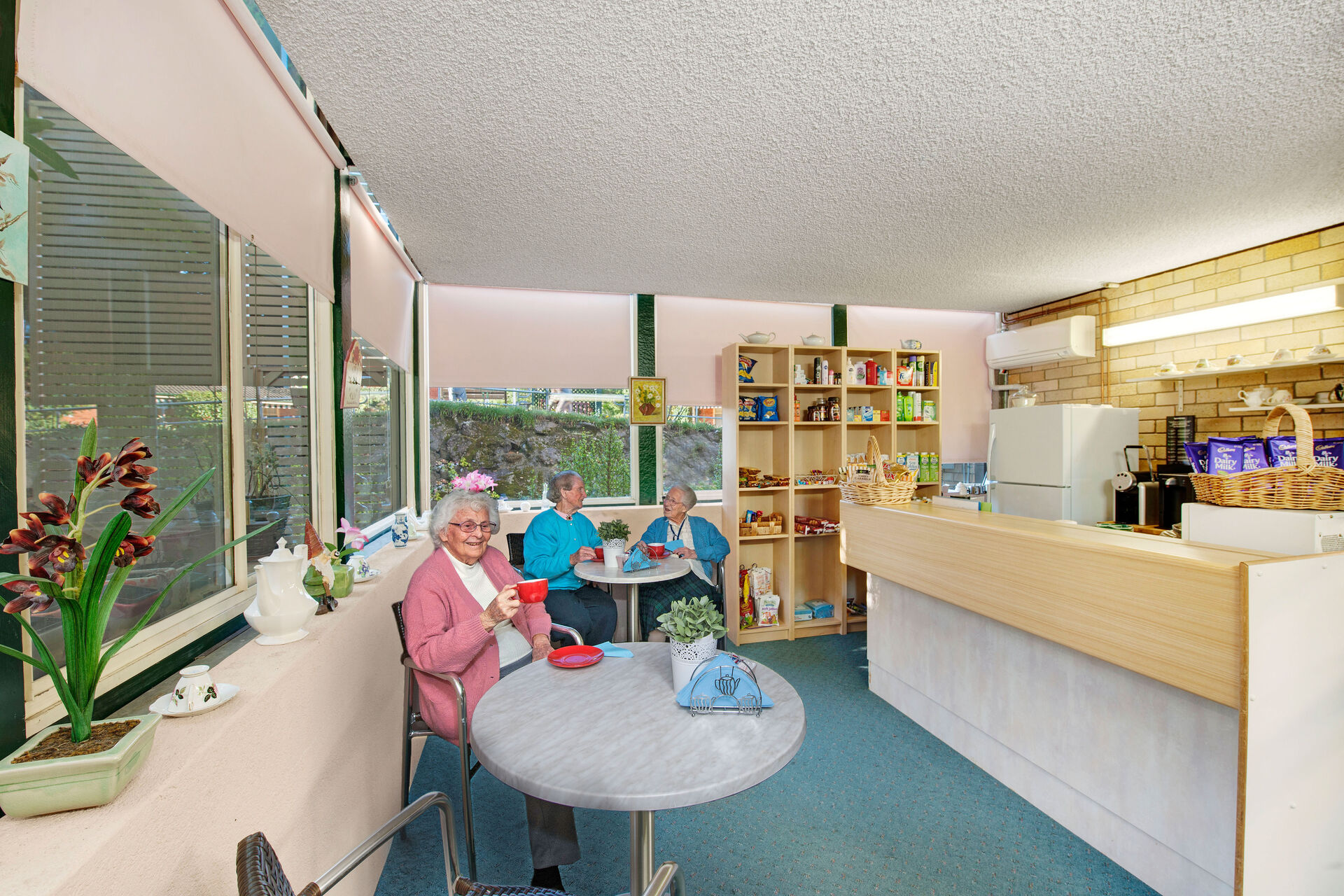 communal sitting space for aged care residents to socialise at baptistcare cooinda court residential aged care home in macquarie park