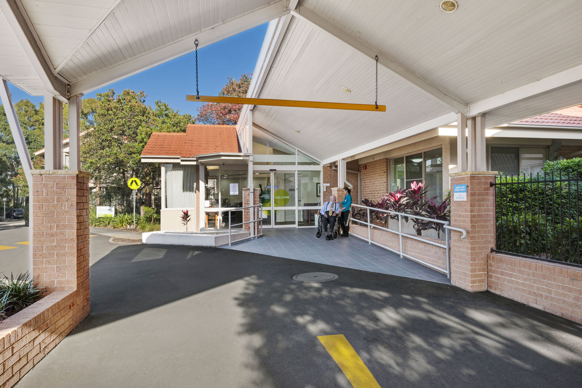 the entry driveway of dorothy henderson lodge aged care home in macquarie park nsw northern sydney
