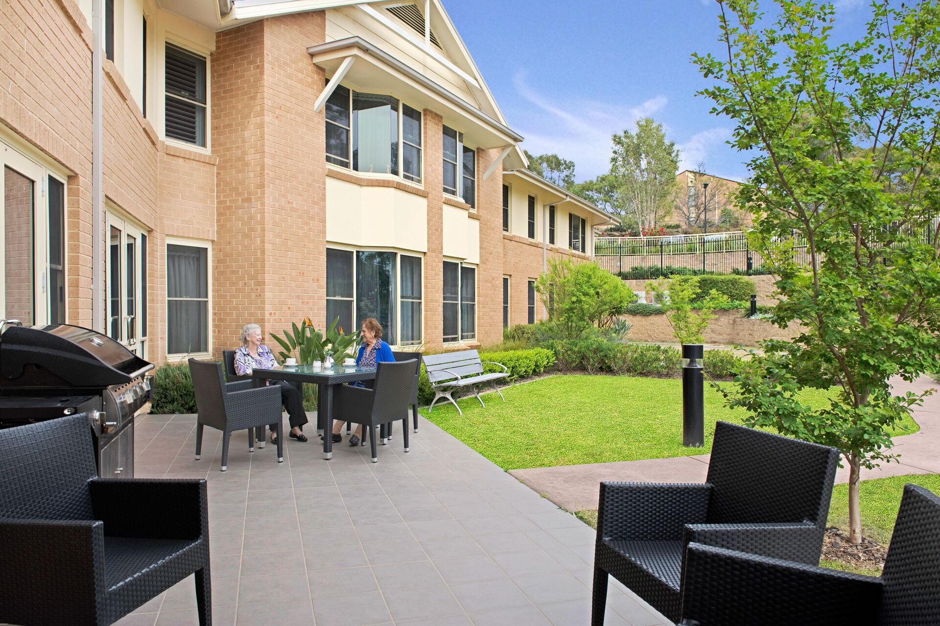 large outdoor sitting area for aged care residents to enjoy in the gardens of baptistcare warena centre in bangor aged care in sutherland shire nsw