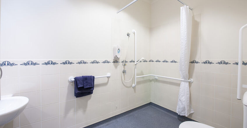 large accessible ensuite for single room for elderly aged care resident including dementia care in baptistcare kularoo centre residential aged care home in forster nsw