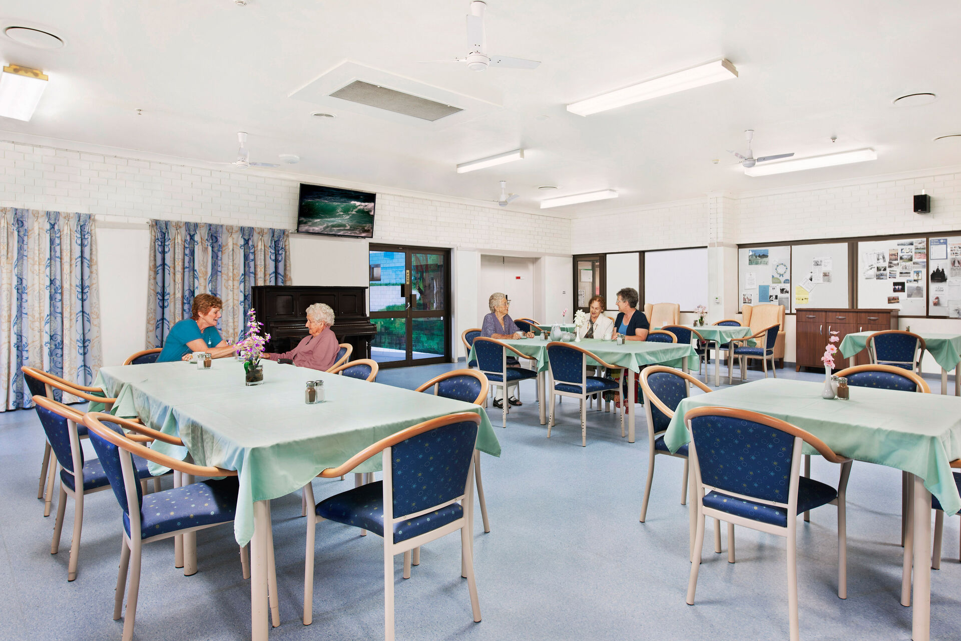 spacious dining room and sitting room for aged care reisdents at baptistcare mid richmond centre residential aged care facility in coraki nsw far north coast