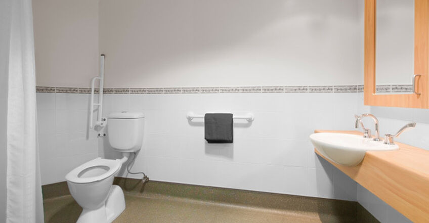 ensuite for spacious private room for elderly aged care resident including dementia care in baptistcare warena centre residential aged care home bangor sutherland shire sydney