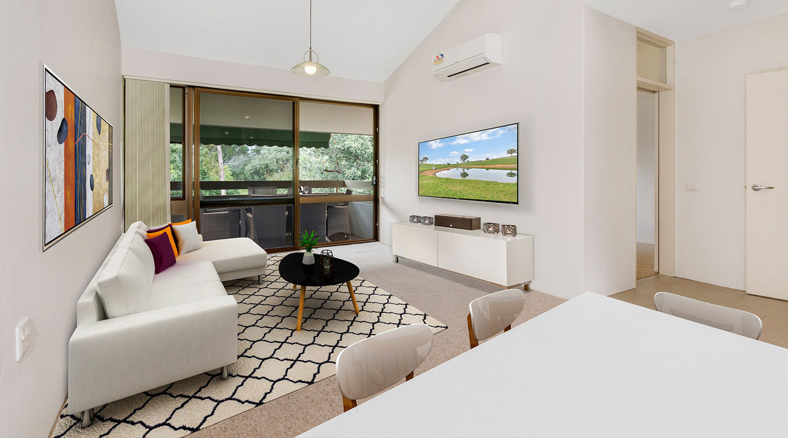 modern lounge room of a two bedroom retirement village apartment in bangor sydney with a balcony baptistcare warena village