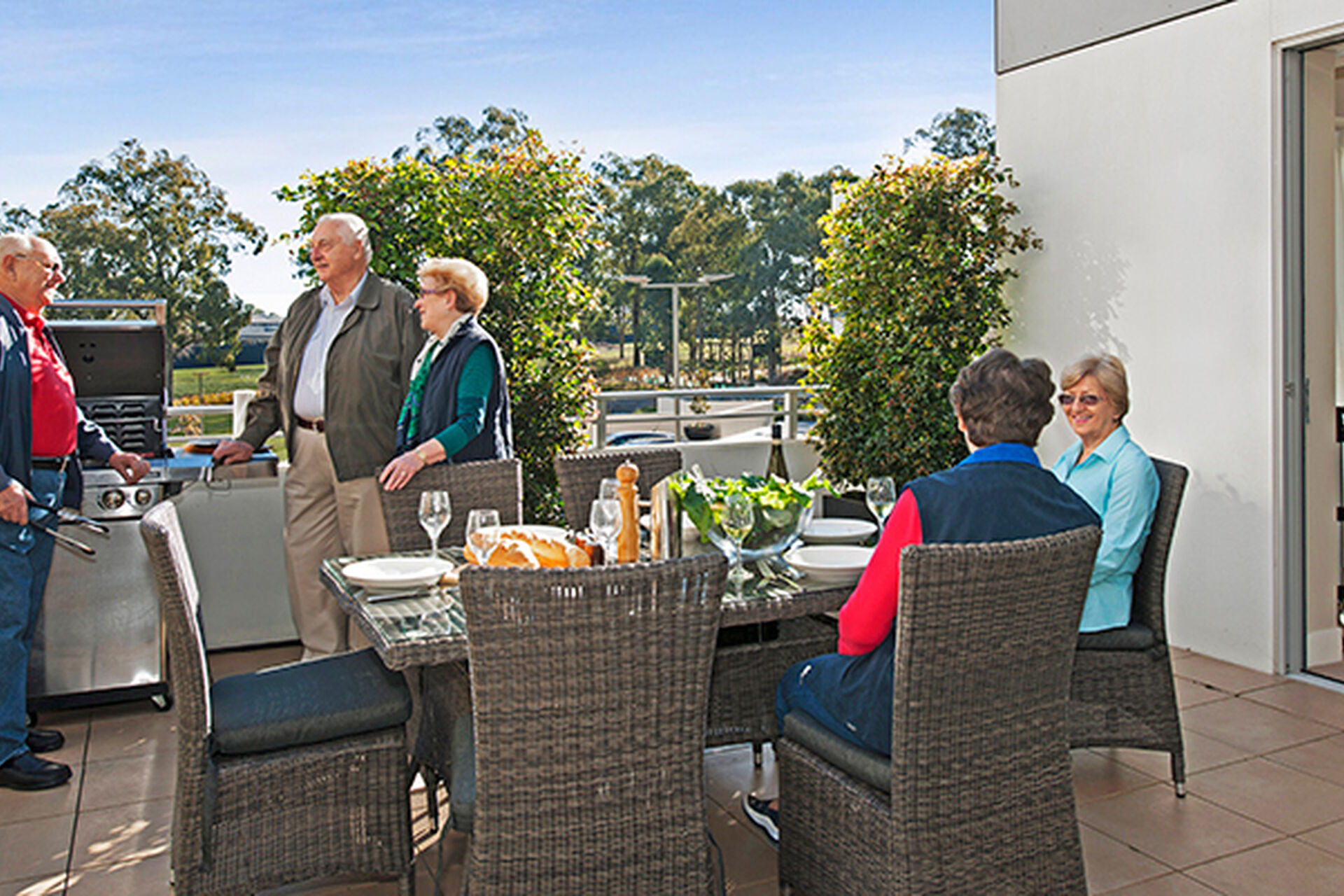 residents socialising on the balcony at baptistcare gracewood retirement village in kellyville hills district