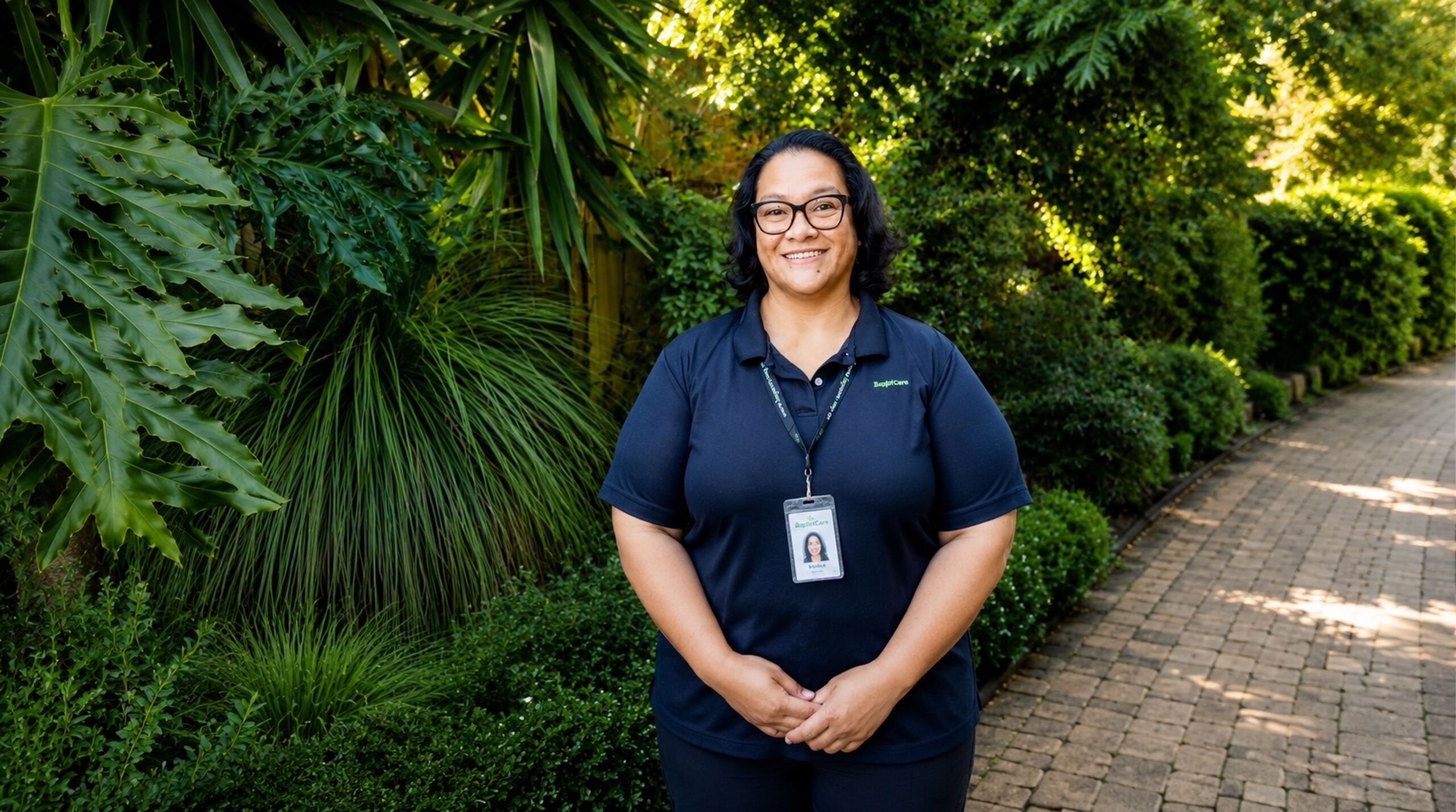 Smiling nurse in the garden 2