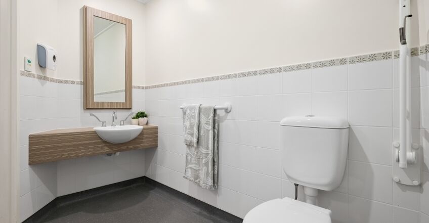 ensuite for spacious private room for elderly aged care resident including dementia care in baptistcare warena centre residential aged care home bangor sutherland shire sydney