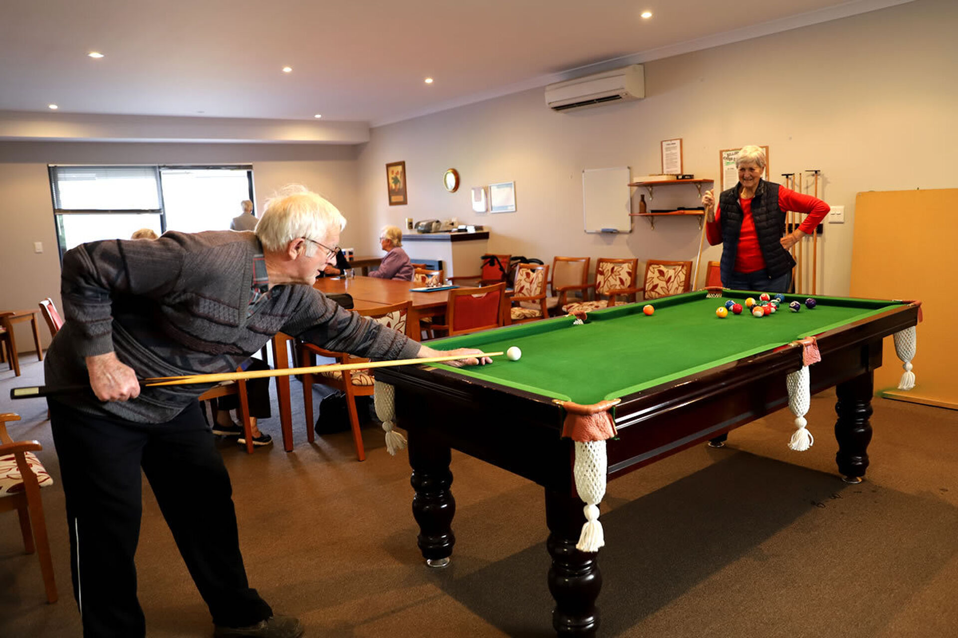 a group of residents of one of the retirement villas at the over 55s baptistcare william carey court retirement village in busselton wa